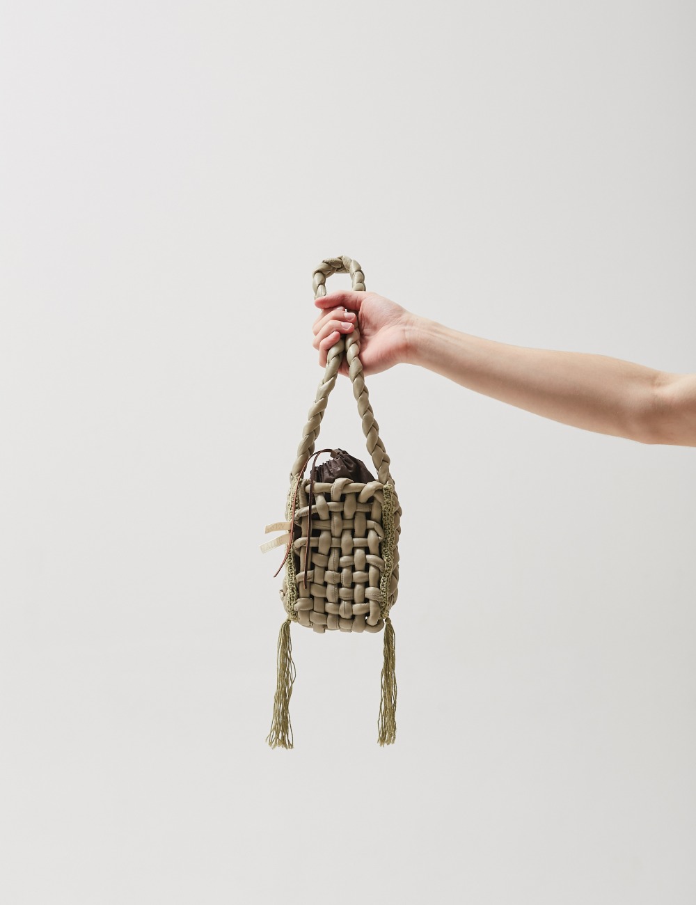 OUR BAG WITH HANDCRAFTED TASSELS_LIGHT GREEN